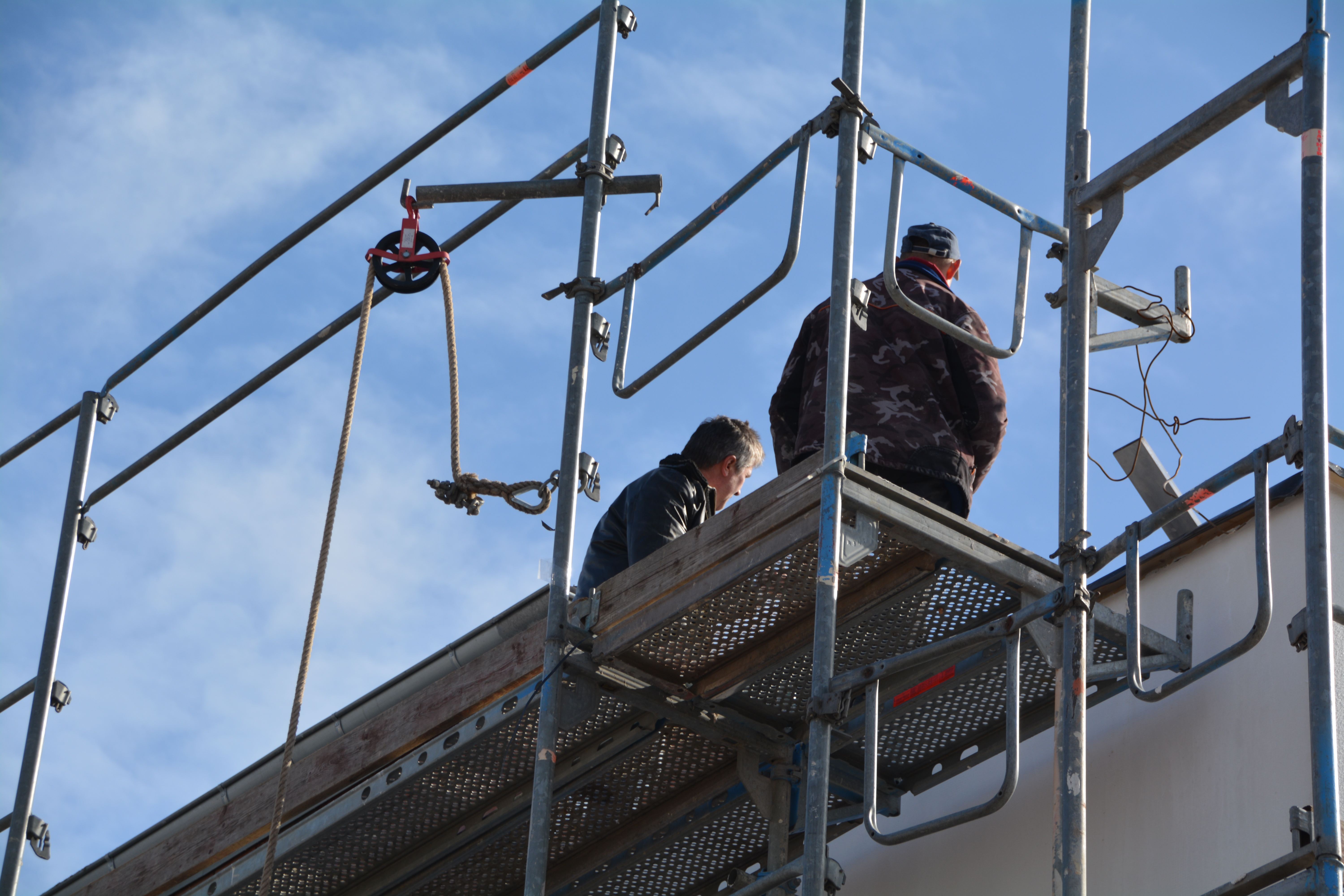 Trabalhadores em Balancim Elétrico